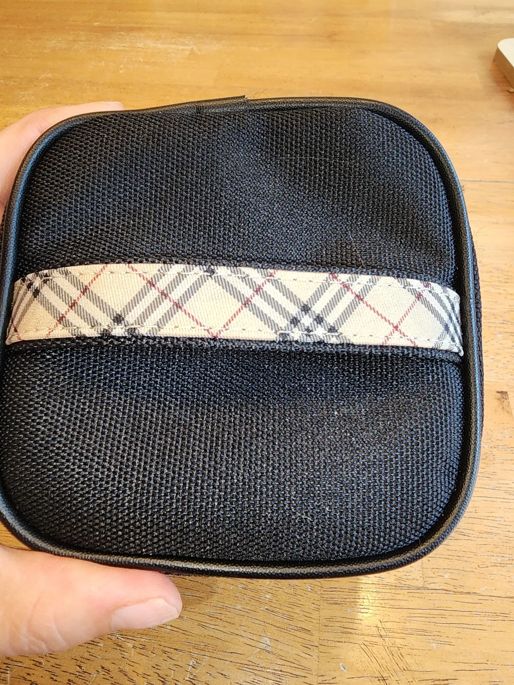 black Burberry vanity Nylon pouch and features a branded metal plate & Novacheck